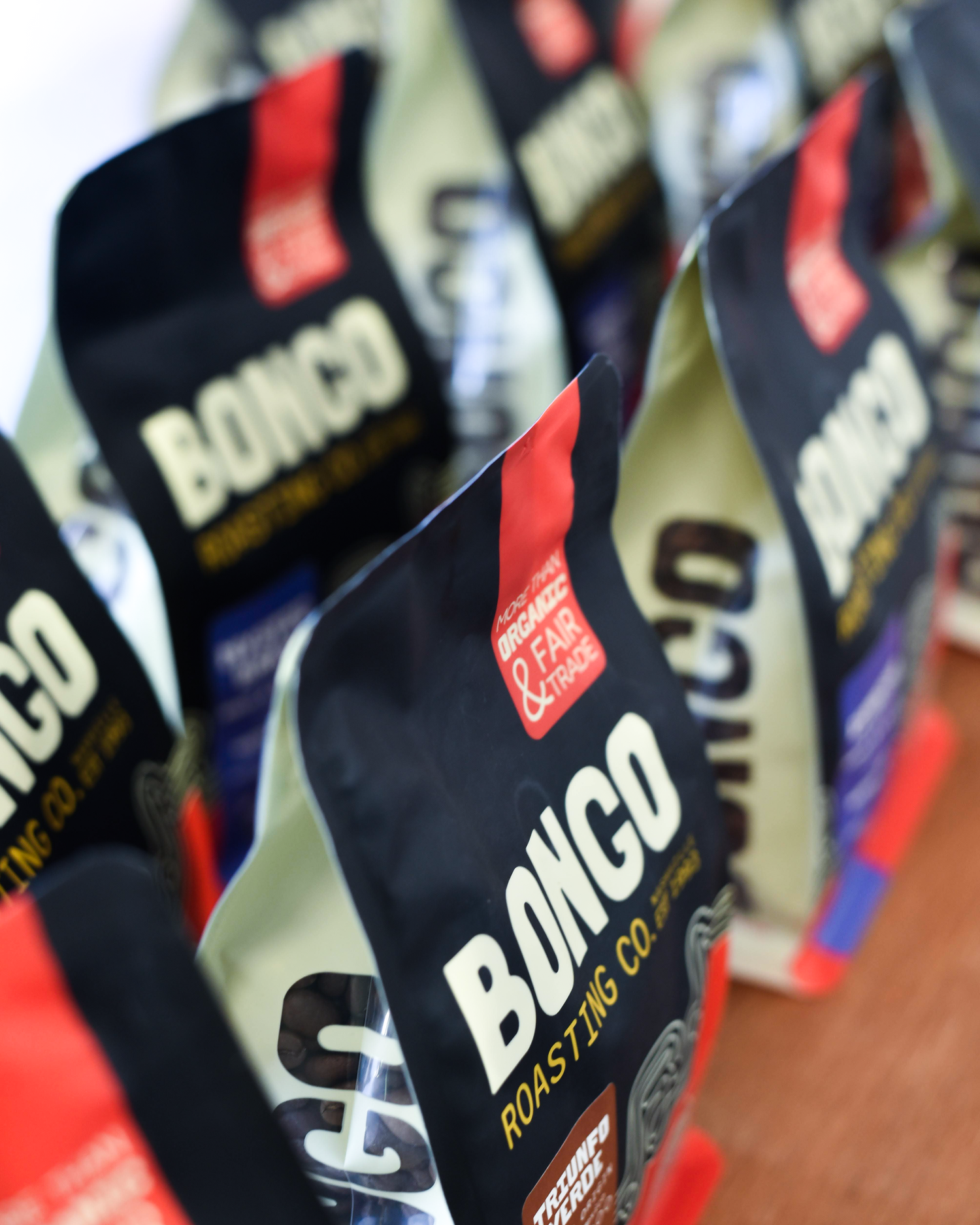 Bongo Coffee packages on a wooden surface